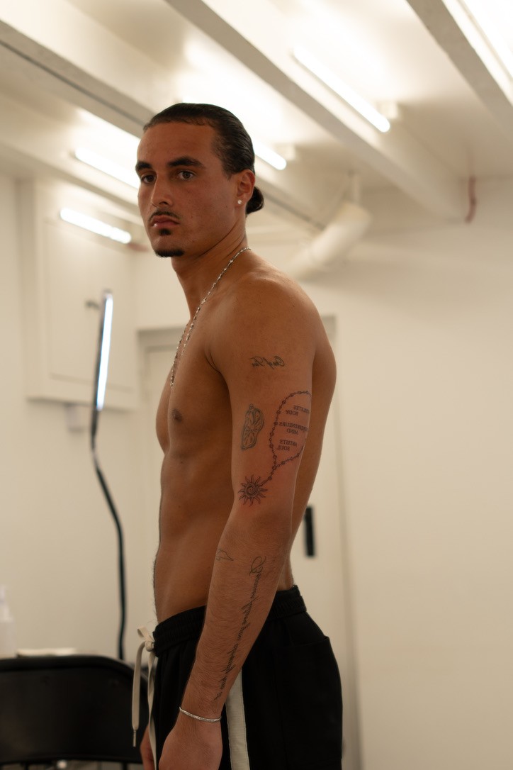 Portrait showing Luigi’s tattoo work